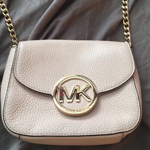 Michael Kors small side purse. Color: Nude